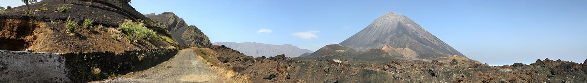 A road leading to Fogo National Park (Parque Natural do Fogo) in 2010 December. Pico do Fogo (2,829 m) on the right is a stratovolcano. This file was…
